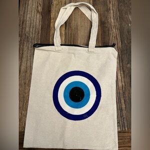 Brand new evil eye canvas tote bags.
